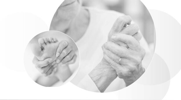 Hands massaging feet and holding hand.